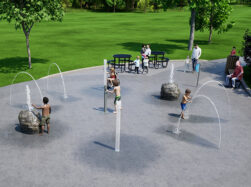 Rendering of children playing on AquaSmart Package D splash pad by Aquatix