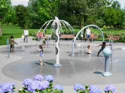 render of children playing on AquaSmart Package K splash pad