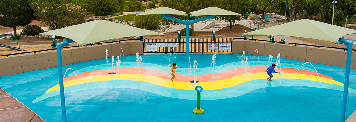Wide shot of the splash pad at the Alamosa Community Center