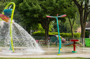 Wide shot of Morningside Park splash pad in Dearborn, Michigan