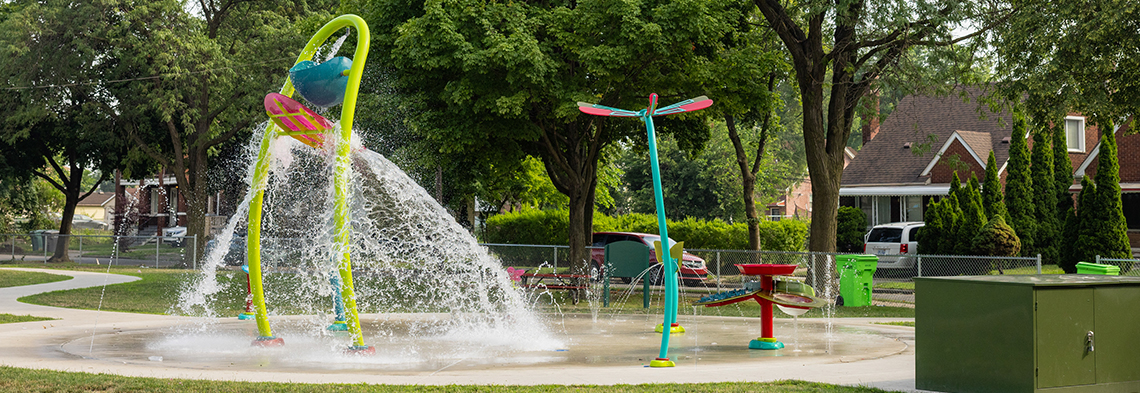 Wide shot of Morningside Park splash pad in Dearborn, Michigan
