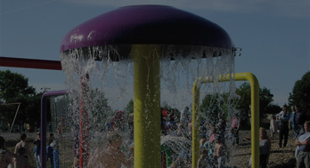 a purple aqua dome with water running off the domed roof